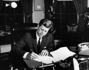 October_23,_1962-_President_Kennedy_signs_Proclamation_3504,_authorizing_the_naval_quarantine_of_Cuba